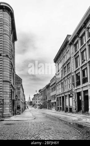Just after dawn in Montreal Canada. the old cobblestone streets are still wet from the night`s rain and no one is out yet. like many cities the early Stock Photo